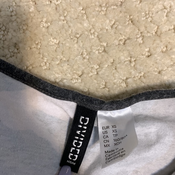 Camouflage crop top. Size xs. Lightly used. Words “work hard play hard” on end - Picture 4 of 6